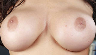 Naked boobs close up.